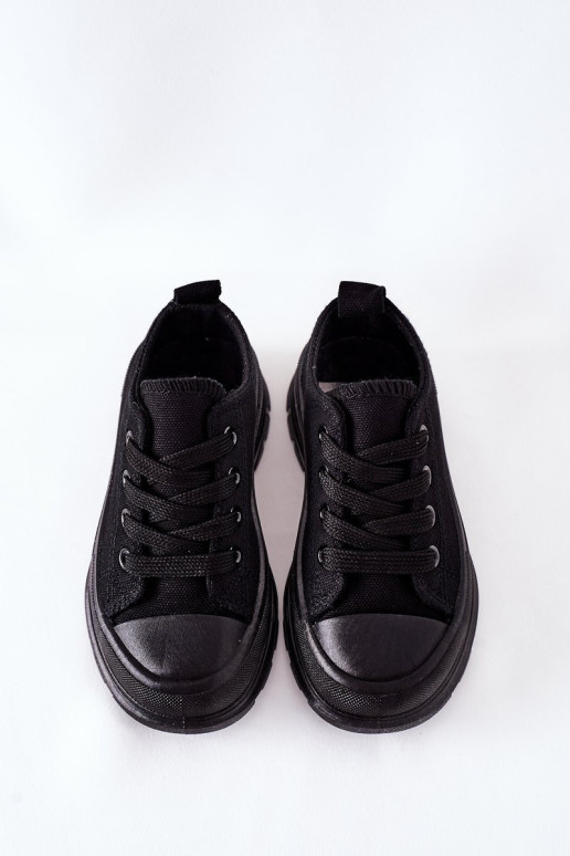 Vaikiški sportbačiai ant platformos juodi kelionės laikas