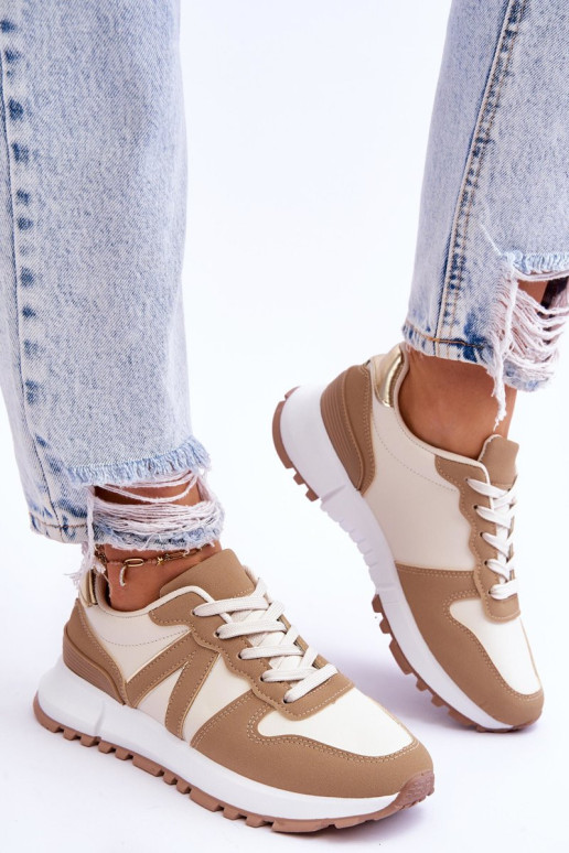 Moteriški žemi sportiniai batai smėlio spalvos...