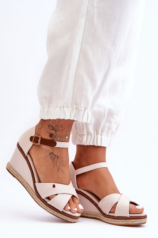 Moteriški sandalai su pleištais Šviesiai smėlio...