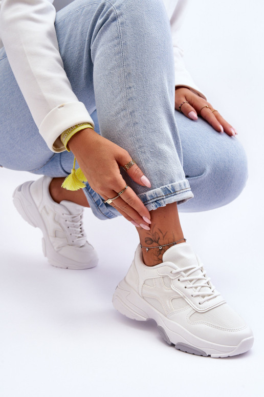 Moteriški suvarstomi sportbačiai White Cortes