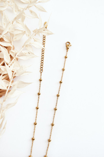 Madinga grandinėlė su balto aukso gėlėmis