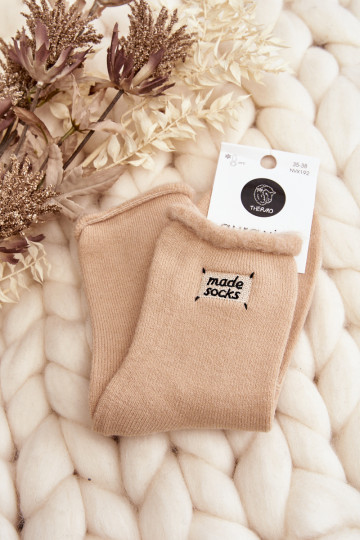 Moteriškos smėlio spalvos storos kojinės