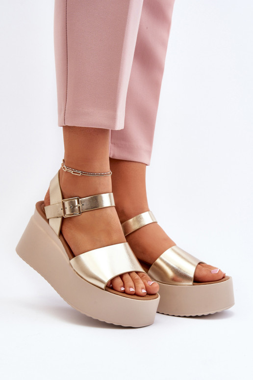 Moteriški auksiniai „Geferia Wedge“ sandalai