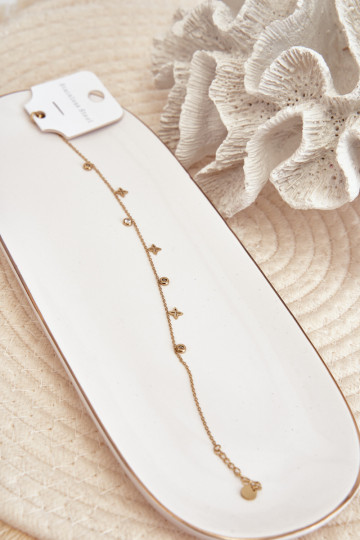 Kulkšnies apyrankė su auksiniais pakabukais