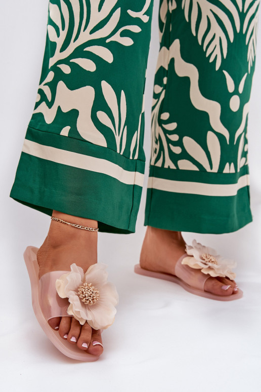 Permatomos plokščios moteriškos šlepetės su dirbtinėmis gėlėmis Nude Vobetta