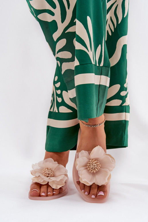 Permatomos plokščios moteriškos šlepetės su dirbtinėmis gėlėmis Nude Vobetta