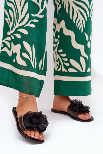 Permatomos plokščios moteriškos šlepetės su dirbtine gėle juoda Vobetta