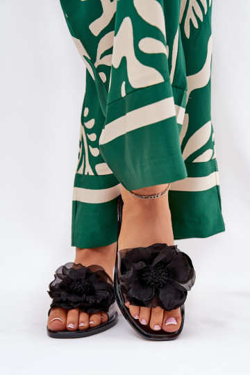 Permatomos plokščios moteriškos šlepetės su dirbtine gėle juoda Vobetta