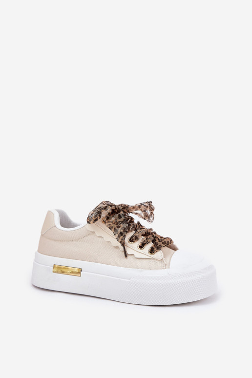 Moteriški sportbačiai ant didžiulės platformos su dekoratyviniu suvarstymu smėlio spalvos Zidora